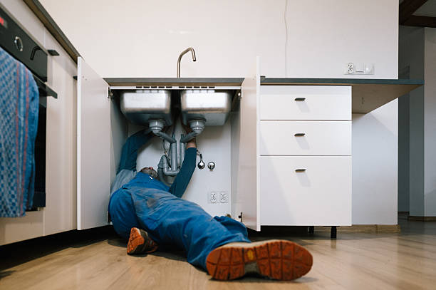 Professional Plumbing technician working in Tram, KY